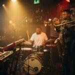 Review: Ezra Collective – Ein Meilenstein des modernen Jazz mit politischer Tiefe und groovigem Drive